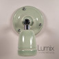 Lampe applique murale orientable en porcelaine vert pastel et métal chromé Lampe applique murale orientable en porcelaine vert pastel et métal chromé