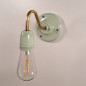 Applique véritable porcelaine verte pastel et tube col de cygne en laiton ciré ou métal vernis Applique véritable porcelaine verte pastel et tube col de cygne en laiton ciré ou métal vernis